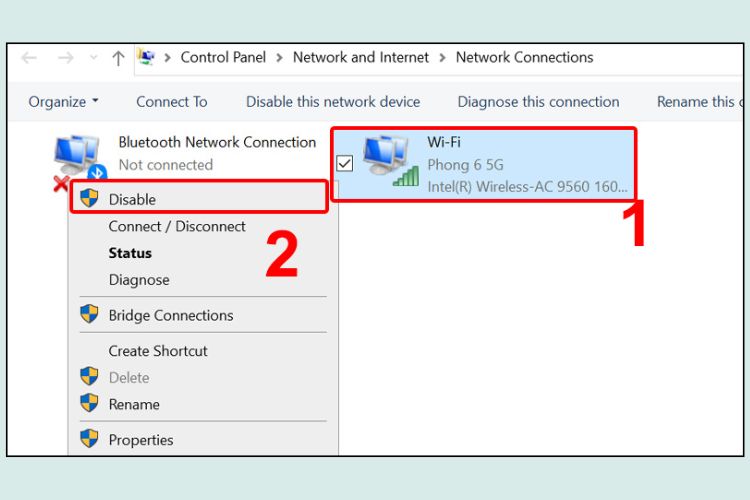 Chuột phải vào Wireless Network Connection > Chọn Disable để tắt card WiFi.