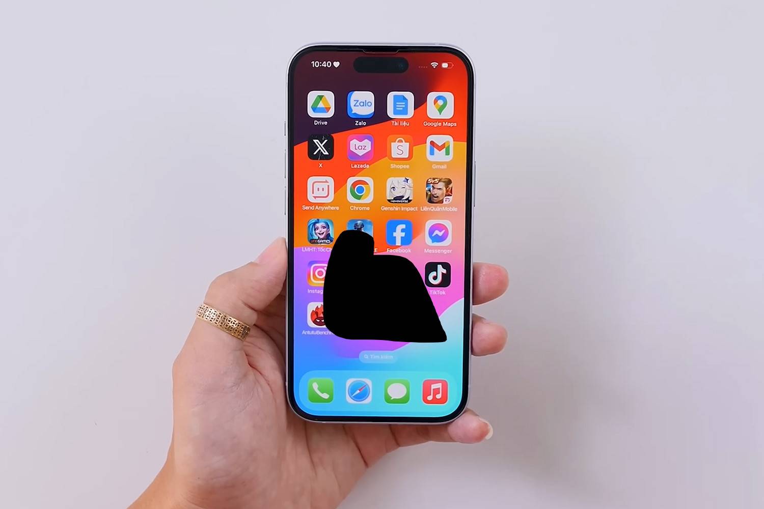 thay-mat-kinh-iphone-15