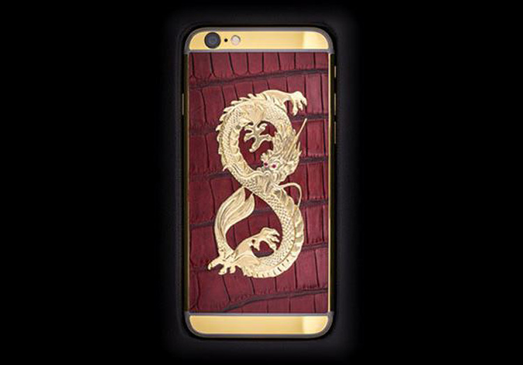 Phiên bản iPhone được thiết kế họa tiết hình rồng đặt trên da cá sấu và chạy xung quanh là vàng 24 carat